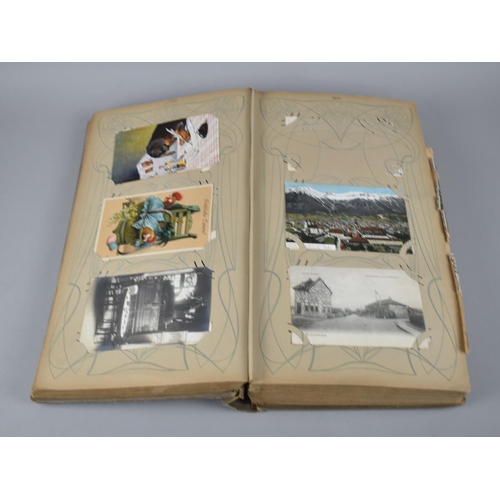 65 - A Large Late Victorian German Postcard Album, The Early Pages Dated from 1899 and Later Cuttings May... 