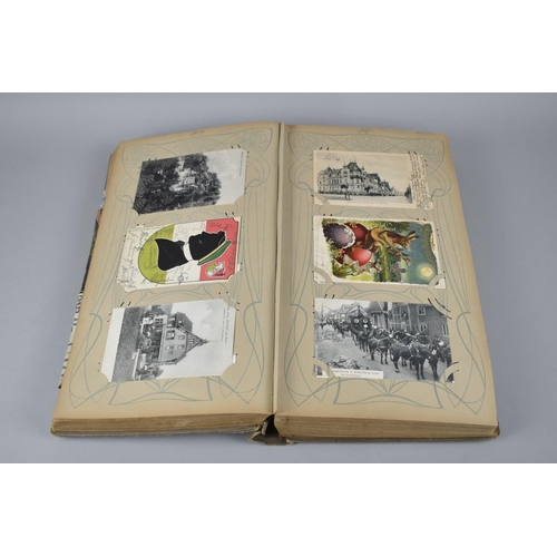 65 - A Large Late Victorian German Postcard Album, The Early Pages Dated from 1899 and Later Cuttings May... 