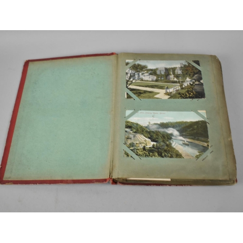 66 - An Early 20th Century Postcard Album containing Mixed Coloured and Monochrome Cards to include Views... 