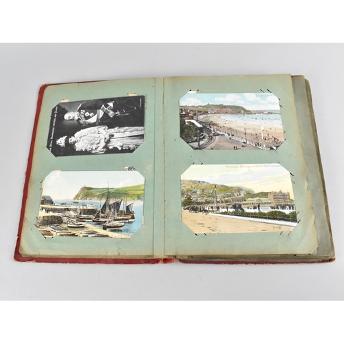 66 - An Early 20th Century Postcard Album containing Mixed Coloured and Monochrome Cards to include Views... 