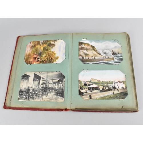 66 - An Early 20th Century Postcard Album containing Mixed Coloured and Monochrome Cards to include Views... 