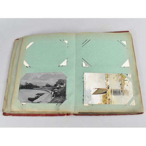 66 - An Early 20th Century Postcard Album containing Mixed Coloured and Monochrome Cards to include Views... 