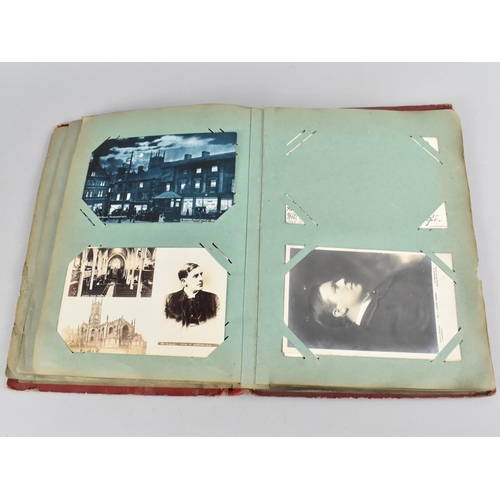 66 - An Early 20th Century Postcard Album containing Mixed Coloured and Monochrome Cards to include Views... 