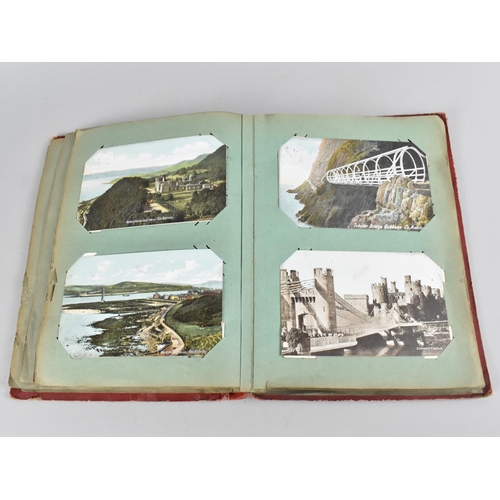 66 - An Early 20th Century Postcard Album containing Mixed Coloured and Monochrome Cards to include Views... 