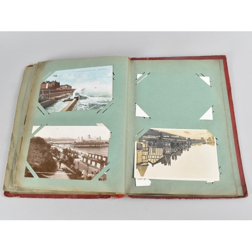 66 - An Early 20th Century Postcard Album containing Mixed Coloured and Monochrome Cards to include Views... 