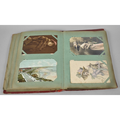 66 - An Early 20th Century Postcard Album containing Mixed Coloured and Monochrome Cards to include Views... 