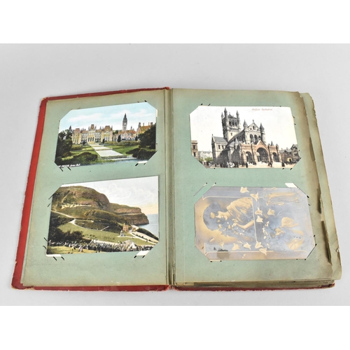 66 - An Early 20th Century Postcard Album containing Mixed Coloured and Monochrome Cards to include Views... 