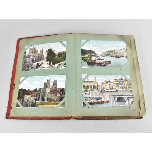 66 - An Early 20th Century Postcard Album containing Mixed Coloured and Monochrome Cards to include Views... 