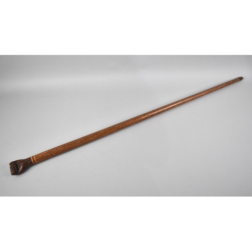 92 - A Walking Cane with Carved Wooden Handle in the Form of a Clenched Fist and Inscribed 