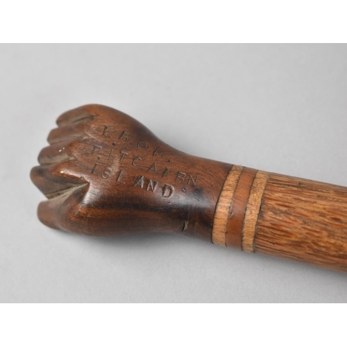 92 - A Walking Cane with Carved Wooden Handle in the Form of a Clenched Fist and Inscribed 