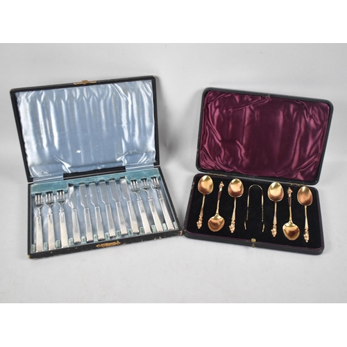 97 - A Cased Set of Six Gilt Apostle Spoons and Matching Bow together with a Cased Set of Six Silver Plat... 