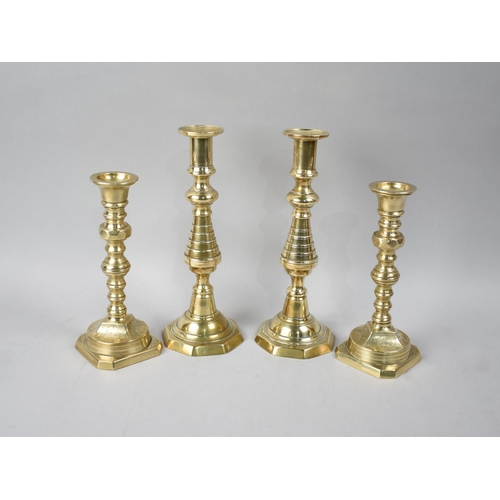 129 - Two Pairs of Victorian Heavy Brass Candlesticks with Pushers, Tallest 25cms