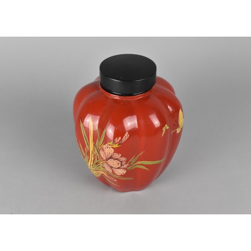 143 - An Oriental Lacquered Tea Caddy of Lobed From decorated with Flowers, 17cms High