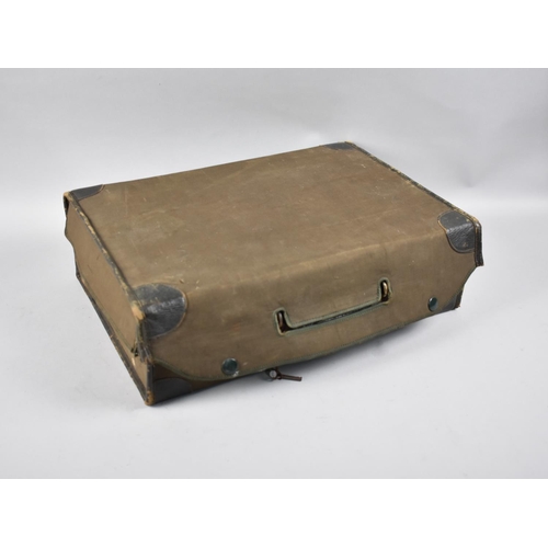 164 - An Edwardian Green Leather Covered Fitted Travelling Case with Canvass Protective Cover, 46cms Wide