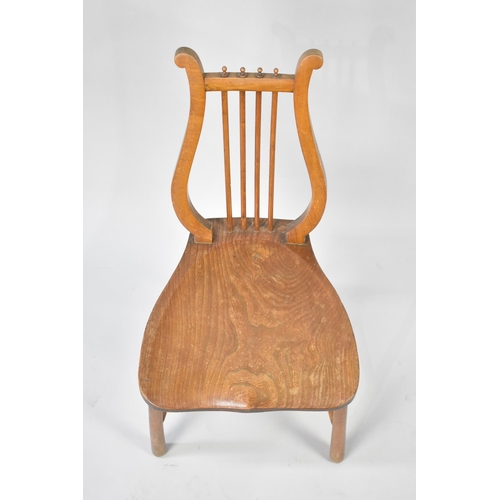 279 - A Late Edwardian Elm Seated Lyre Back Side Chair