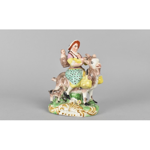 383 - A Staffordshire Type Figure Group, The Tailor's Wife Riding Goat, 13cm high