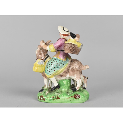 383 - A Staffordshire Type Figure Group, The Tailor's Wife Riding Goat, 13cm high