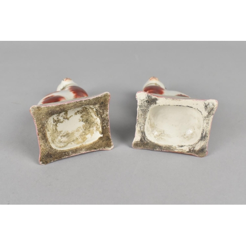 391 - A Pair of Porcelain Studies of Cats, Modelled Seated on Cushion in the Liver Colourway, 10cm high