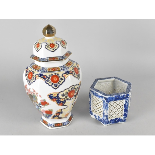 399 - An Oriental Hexagonal Vase and Cover Together with a Pierced Hexagonal Vase