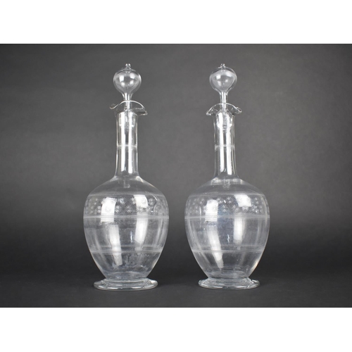 407 - A Pair of Late 19th/Early 20th Century Etched Glass Decanters, 31cm high