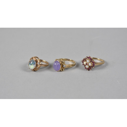 431 - A Collection of Three Jewelled 9ct Gold Rings to include Ruby and Opal, Opal Cabochon in Floral Moun... 