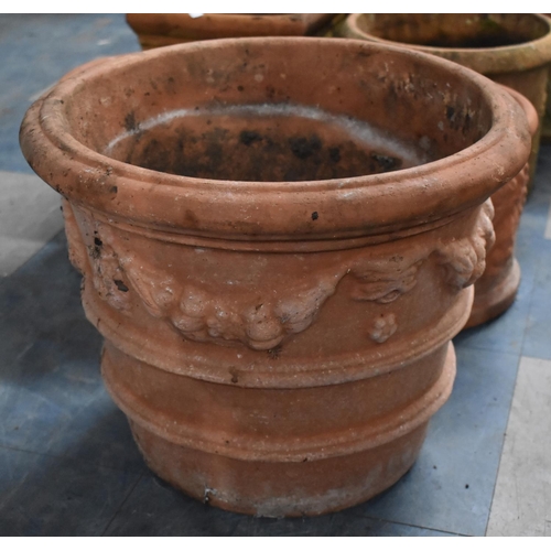 467 - Two Graduated Terracotta Planters, one with Swag Decoration in Relief, 53cms