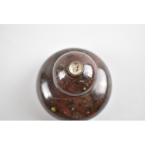 48 - A Souvenir Serpentine Marble Paperweight with Inset Compass, 7cms Diameter