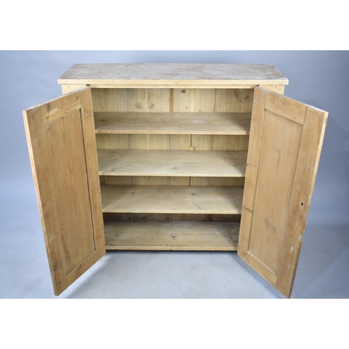 550 - A Stripped Pine Shelved Side Cabinet, 98cms Wide