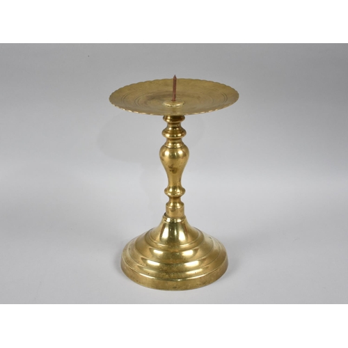 64 - A 19th Century Brass Ecclesiastic Candle Pricket on Circular Base, 27cms  High