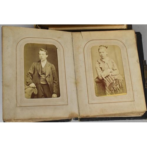 74 - Two Late Victorian/Edwardian Photograph Albums, The Smaller Containing Family Portraits, Both with B... 