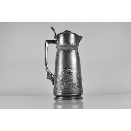 111 - A Large Orovit Lidded Pewter Jug decorated in Relief with Fox Chasing Ducks and Stag Grazing, 35cms ... 