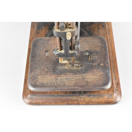 96 - A Late 19th Century Willcox and Gibbs Sewing Machine Co, Hand Cranked Sewing Machine On Wooden Plint... 