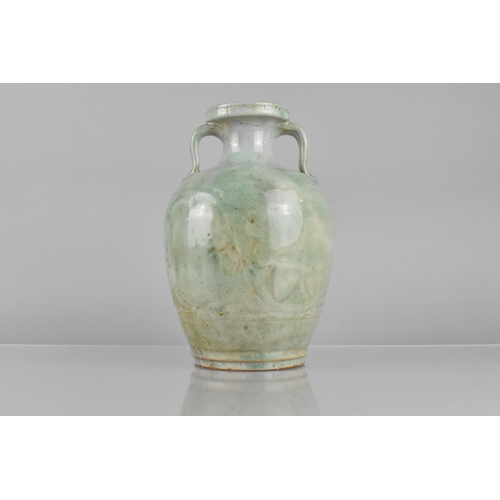 247 - A Chinese Ming/Qing Dynasty Jun Ware Glazed Twin Handled Vase Body Decorated in Shallow Relief Lotus... 