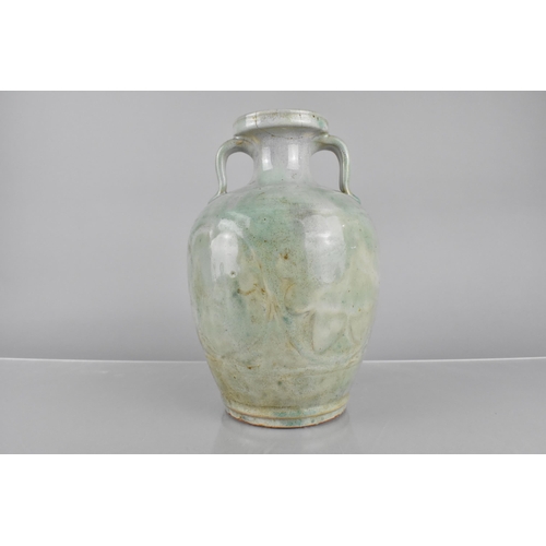 247 - A Chinese Ming/Qing Dynasty Jun Ware Glazed Twin Handled Vase Body Decorated in Shallow Relief Lotus... 