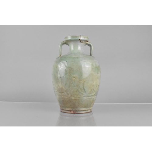 247 - A Chinese Ming/Qing Dynasty Jun Ware Glazed Twin Handled Vase Body Decorated in Shallow Relief Lotus... 