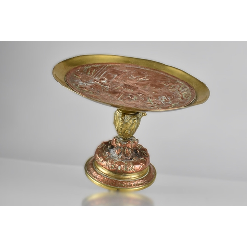 195 - A 19th Century Brass and Copper Tazza with a Baroque Allegorical Decoration, 18cm Diameter, 13cm Hig... 