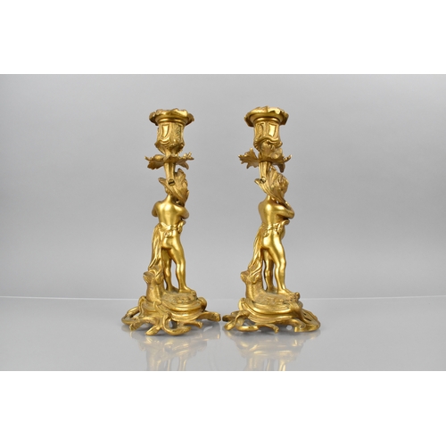 205 - A Pair of 19th Century Gilt Bronze Candlesticks Modelled with Classical Cherubs Supporting Acanthus ... 