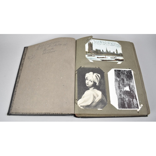 117 - An Early 20th Century Postcard Album Containing Various Colour and Monochrome Postcards, Greetings C... 