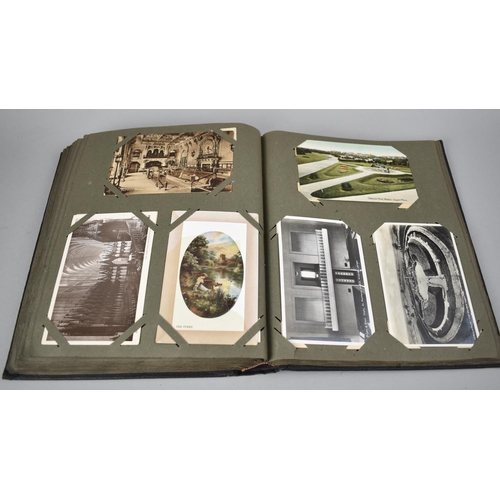 117 - An Early 20th Century Postcard Album Containing Various Colour and Monochrome Postcards, Greetings C... 