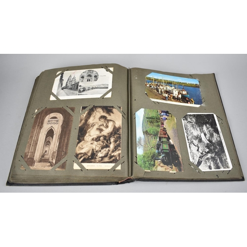 117 - An Early 20th Century Postcard Album Containing Various Colour and Monochrome Postcards, Greetings C... 