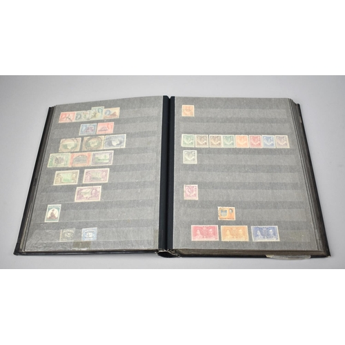 195 - A Stamp Stock Book Containing World Stamps to include South Africa, Rhodesia, Canada, New Zealand Et... 