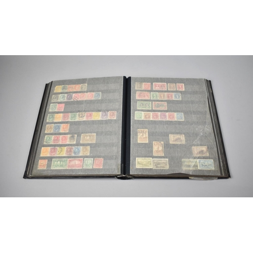 195 - A Stamp Stock Book Containing World Stamps to include South Africa, Rhodesia, Canada, New Zealand Et... 