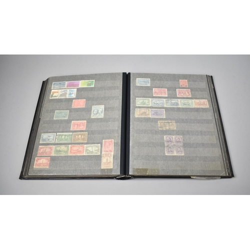 195 - A Stamp Stock Book Containing World Stamps to include South Africa, Rhodesia, Canada, New Zealand Et... 