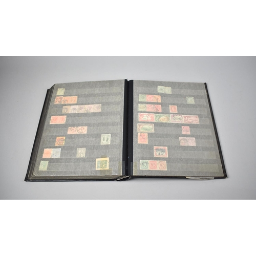 195 - A Stamp Stock Book Containing World Stamps to include South Africa, Rhodesia, Canada, New Zealand Et... 