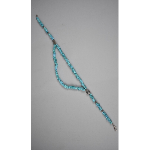 301 - A Silver and Howlite Chip Bead Necklace