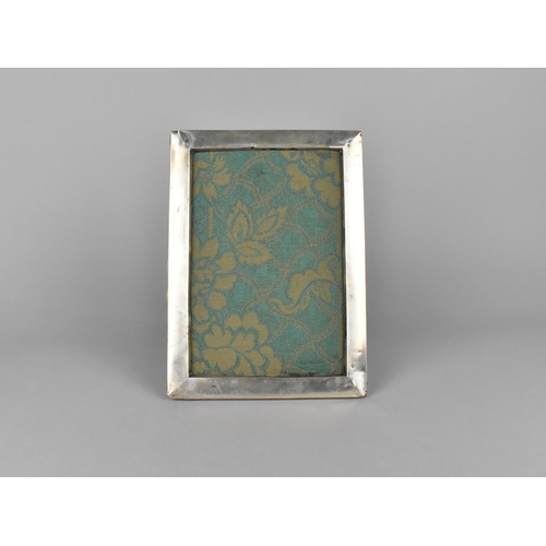 453 - A Silver Easel Backed Photo Frame bu CSC and Co, Birmingham 1918,18x24cms, No Glass