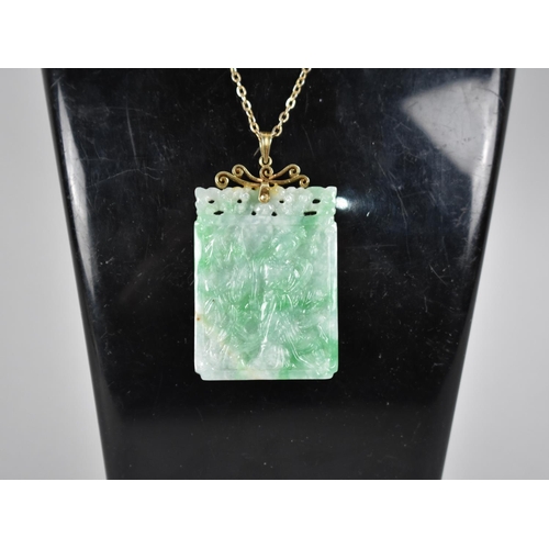 463 - A 14ct Gold and Mottled Green Jade Carved Rectangular Pendant with Phoenix to One Side and Maiden Ve... 