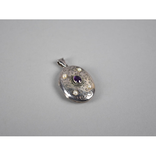 471 - A Modern Silver Locket with Central Oval Mixed Cut Amethyst and Four Radiating Pearl Embellishments,... 