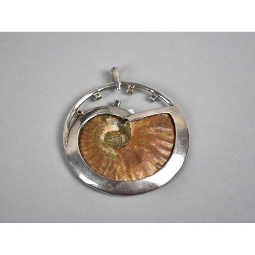 482 - A Nice Quality White Metal Circular Jewelled Pendant, Central Ammonite in White Metal Frame With Col... 