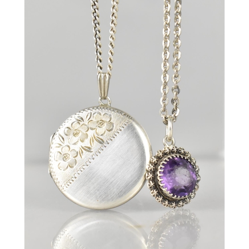 489 - A Silver Locket and Chain by HG&S, Birmingham 1977, together with a Silver and Purple Jewelled Penda... 